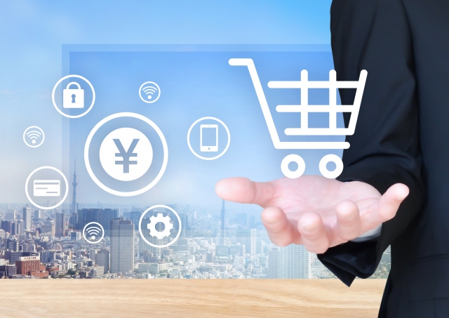 カートや¥マーク・歯車などのアイコンが浮かんでいる画像